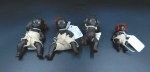 4 black bisque dolls